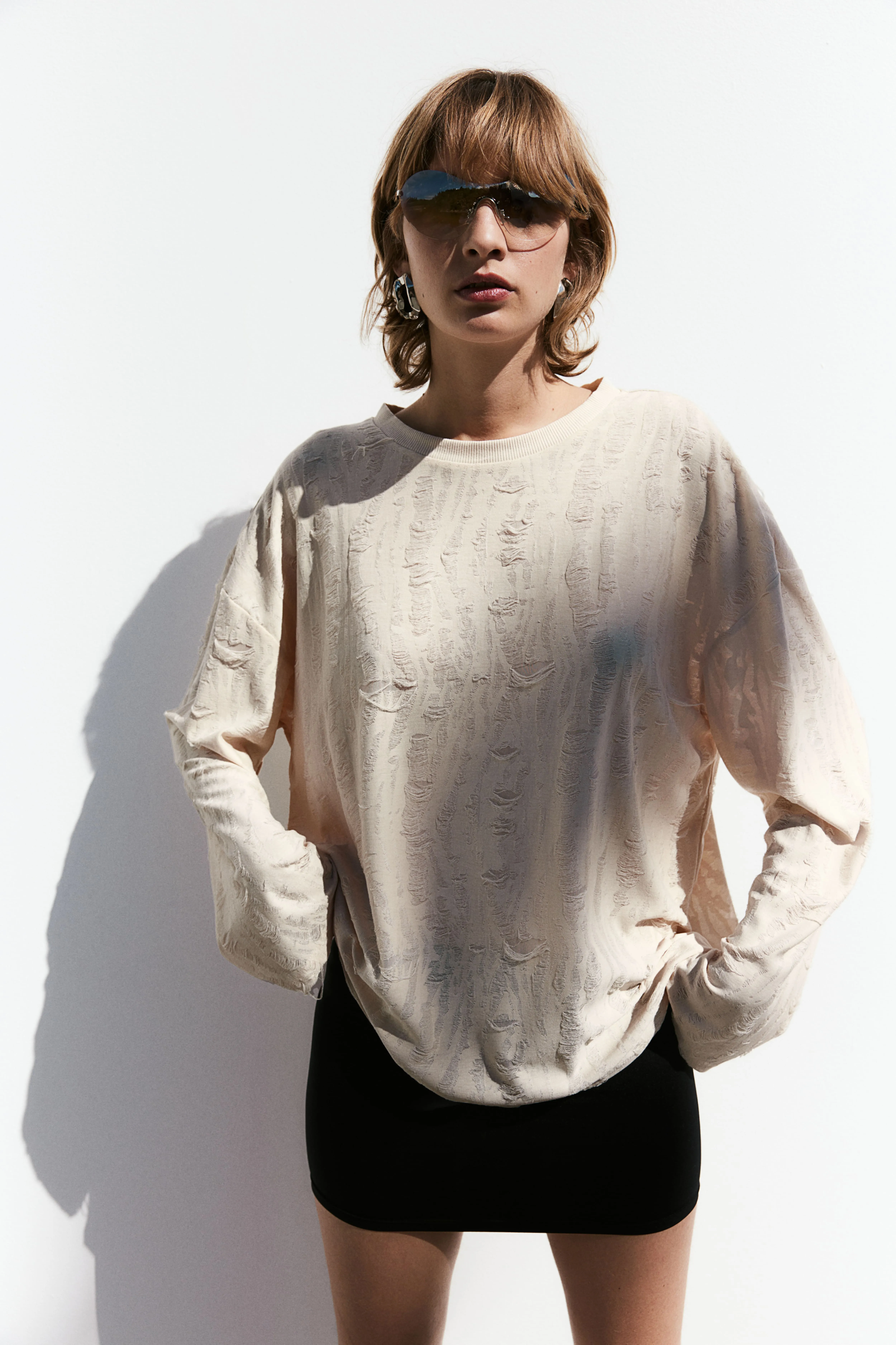 Oversized worn-look top - Round neck - Long sleeve - Light beige - Ladies | H&M GB