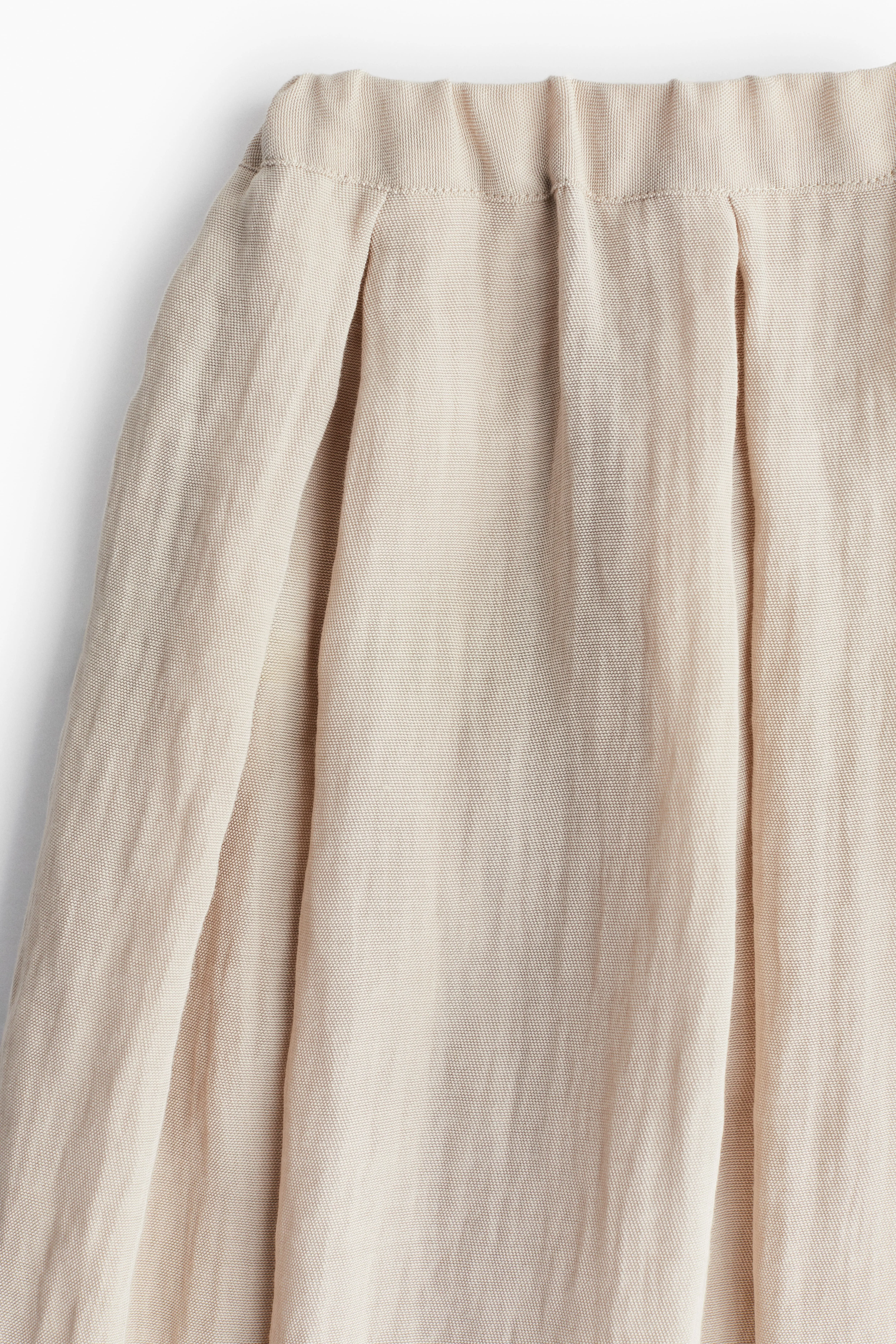 Pleated skirt - High waist - Midi - Light beige - Ladies | H&M GB