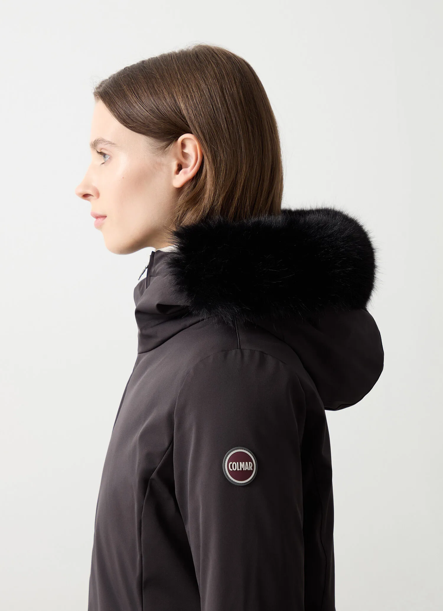 Waterproof down jacket with faux fur-